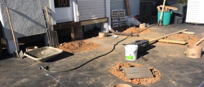 excavator digs basement